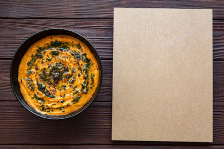 Tasty cream pumpkin soup, copy space, space for text and recipe, top view.の写真素材