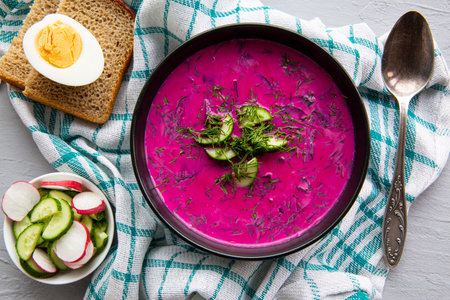 Lithuanian soup cooler with cucumbers, radish and egg. Tasty healthy dish, top view.の写真素材