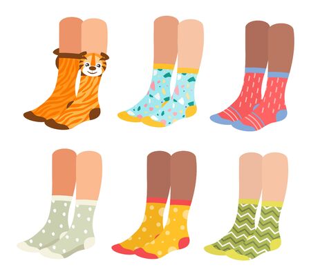Socks on woman legs vector illustration set. Cartoon flat collection of girl underwear accessories, sock pair with colorful ornament, print and pattern, funny warm socks footwear isolated on whiteのイラスト素材