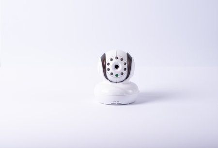 Baby camera isolated on white. CCTV equipment. Baby monitor units on white background. Radio nanny. White babyphone isolated on white.の写真素材