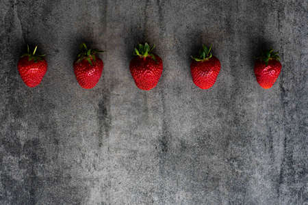 Background from freshly harvested strawberries, directly above. Top of view fresh strawberry on...