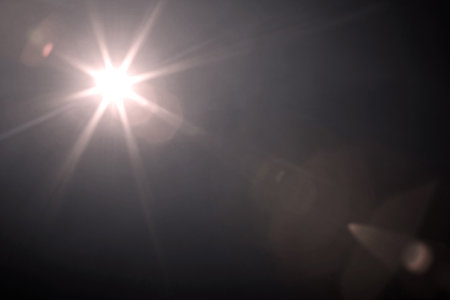 Lens flare effect in black background, natural lens flare, sun flare