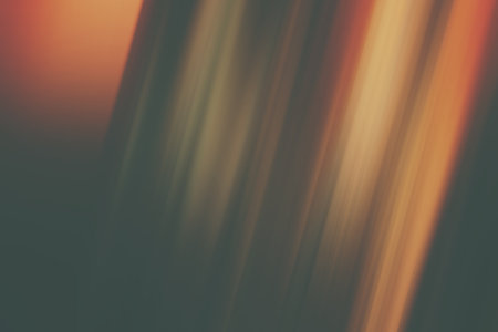 Bright colored blurred brushstrokes as multicolored in orange color palette flashes for an abstract background, tonedの写真素材