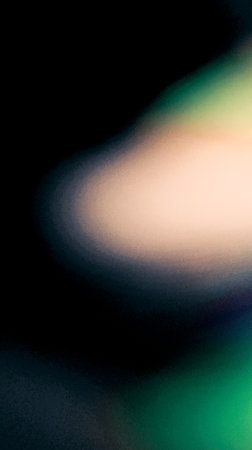blurred light spot on black background - retro vintage effect style pictures textureの写真素材