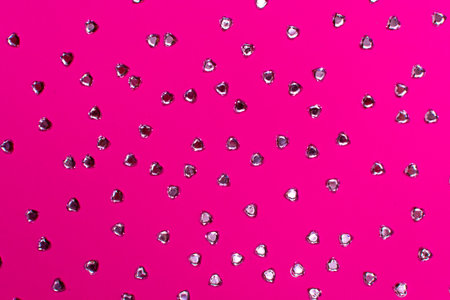 Pink background with colorful hearts. Love concept, Valentines Day.