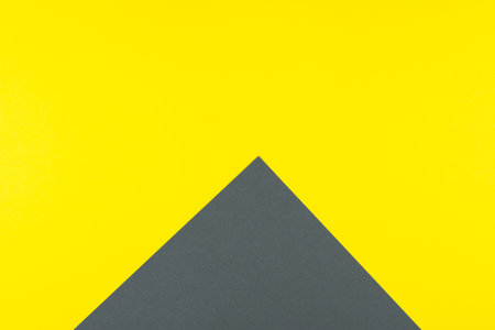 Two-tone background: yellow and gray. Demonstration of trendy colors 2021. Place for inscriptionの写真素材