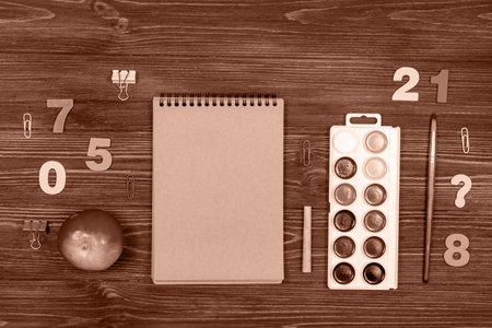 School supplies, office supplies on a dark wood background.の写真素材