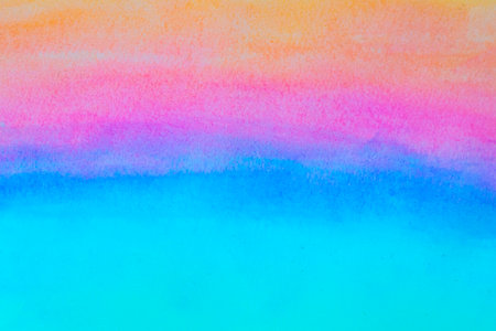 Abstract gradient artwork with vibrant blue, pink, and orange watercolor shadesの写真素材
