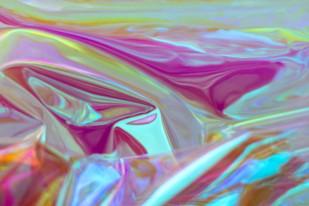 Abstract colorful liquid texture with iridescent pink and blue huesの写真素材