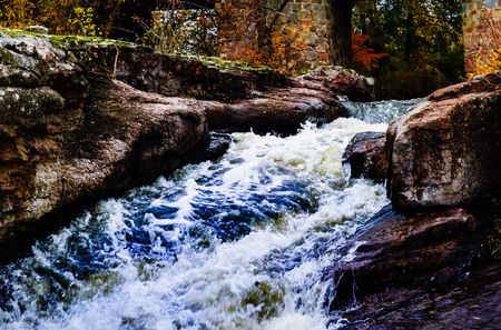 mountain river against the background of the autumn landscape, natural light
