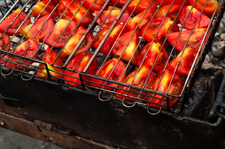 concept of street food, vegetables on the grill, close-up, space for textの写真素材