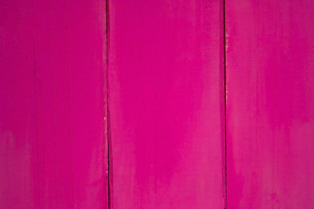 colored delicate wooden background in pink color, space for text,の写真素材