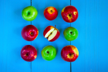 food-pattern, apples on a blue wooden background, top view, copy spaceの写真素材