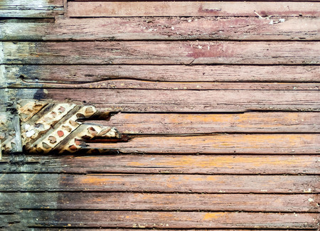 Colorful background of wooden boards painted with age, natural light, copy space, closeup,の写真素材