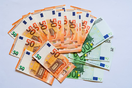 Cash euro on isolated white background.Closeup, copy space.