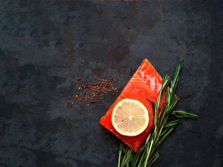 Salmon fillet on vintage rustic metal background.の写真素材