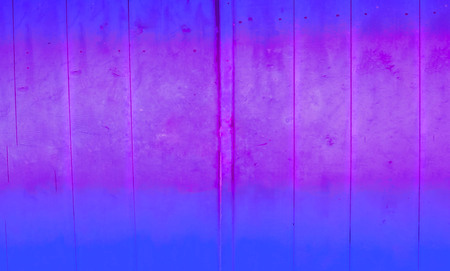 Saturated blue wooden background of door. Concept of natural materials. Trendy color. Close-up, copy...