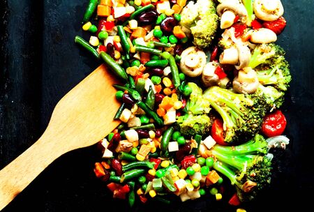 Mushroom-Vegetable Blends on black background. Health-conscious diet. Budget-friendly menu.Close-up, copy spaceの写真素材