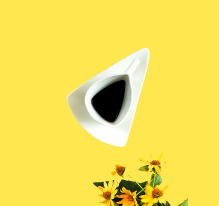 Creative background with white cup of coffee and yellow flowers. Calming Simplicity and Sustainable health for quarantine. Trendy color 2021-Yellow. Creative copy space. Close-upの写真素材