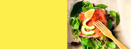 Salmon fillets with spinach and avocado in sustainable packaging. Concept health-conscious. Close-up.Top view.の写真素材