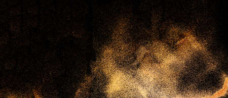 Abstract dark background with golden sparkles. Blurred effect. Concept for festive background or for project.Close-upの写真素材