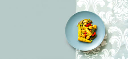 Diet salad of mushrooms and vegetables on gray background. Vegetarian food concept. Creative layout....