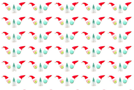 Pattern from Christmas tree toy of fir tree and colored macaroons on white background. Design for festive wrapping paper. Festive mood.の写真素材