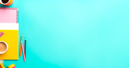 Supplies, notebook, pencils on blue background.Trendy background for design of stationery. Back to work or Back to school. Copy space. Generative Ai content.の素材