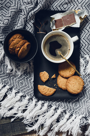 Coffee with cookies and chocolate, home cozy concept.の写真素材