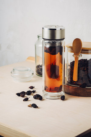 Rosehip tea Drink and dried rose hips.