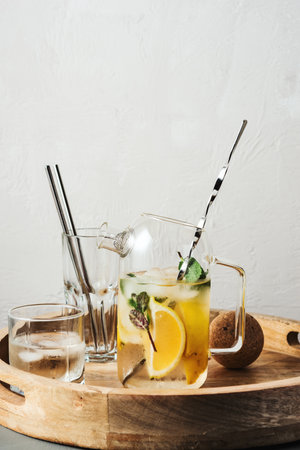 Cold drink with lemon, mint and ice.の写真素材