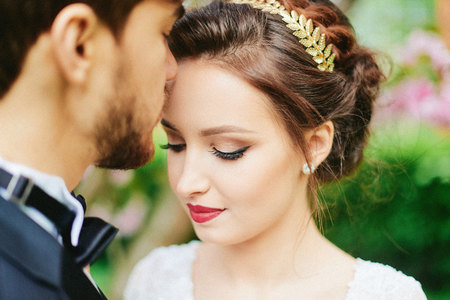 Wedding in park cherry blossom bride groomの写真素材