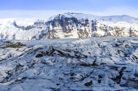 Huge white glacier in the background mountains in Icelandの写真素材
