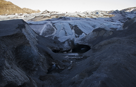Huge white glacier in the background mountains in Icelandの写真素材