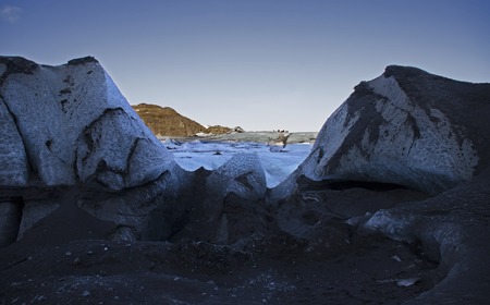 Huge white glacier in the background mountains in Icelandの写真素材