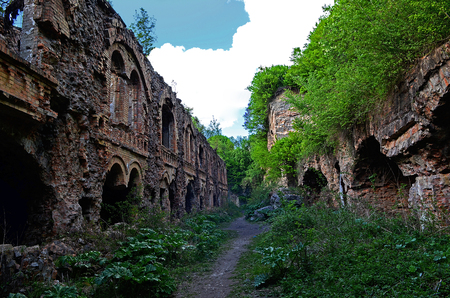 Old red brick walls in ruined defensive fort. Ukraineの写真素材