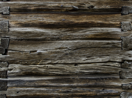 Vintage aged dark brown wooden background texture close up. texture of a wooden board of solid wood.の写真素材