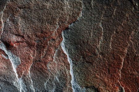 A natural background made of multi-colored wild stone close-up. Top Viewの写真素材