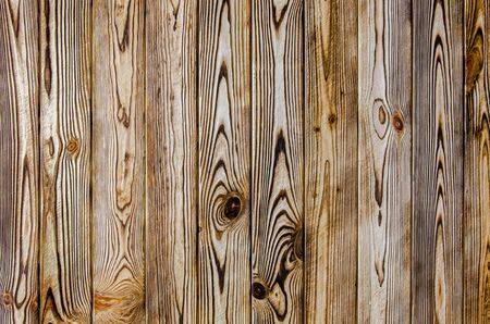 The wooden background of old brown natural boards. Top viewの写真素材