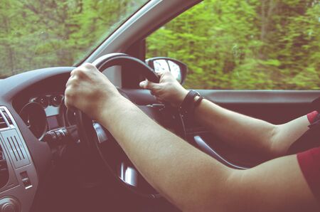 Driving Car. young man driving a business car. trip of a businessman