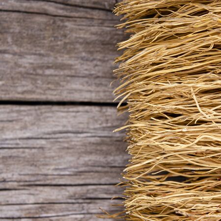 A multi-colored textured background made of natural materials. Close-up. Top view