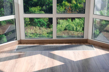 Protective grille mounted on the floor to heat the panoramic windowの写真素材