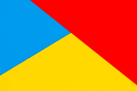 Multi-colored red yellow blue graphic background. View from above. Bright background