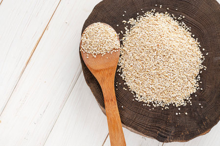 Raw dried broken barley cereal grain texture background macro closeup. Barley groats, coarse barley semolinaの写真素材
