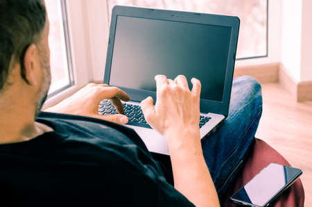 Concept of distance learning, isolation, business, shopping online. Close up of man handsの写真素材