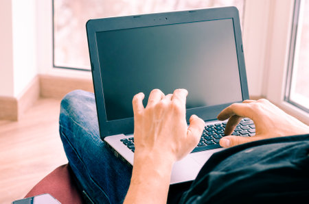 Concept of distance learning, isolation, business, shopping online. Close up of man handsの写真素材