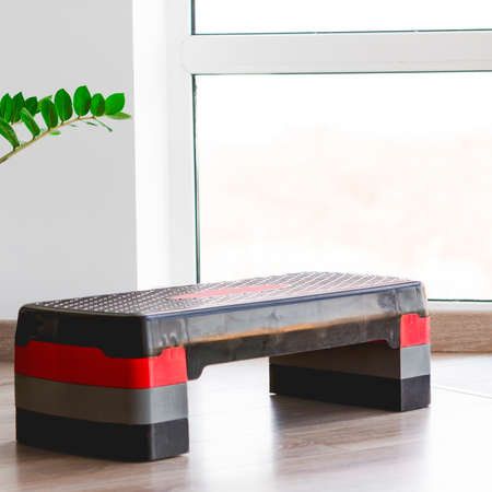 step platform, plastic board for fitness, middle position of the platform height. Space for textの写真素材