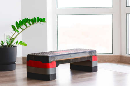 step platform, plastic board for fitness, middle position of the platform height. Space for textの写真素材