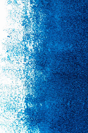 Uneven dark blue plaster applied to the wall surface. Artistic Rough Texture Of A Stylized Banner With Space For Textの写真素材