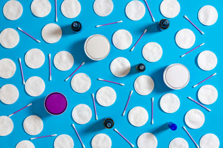 Cosmetic content. Top view. Flat lay composition with cosmetic products on color backgroundの写真素材